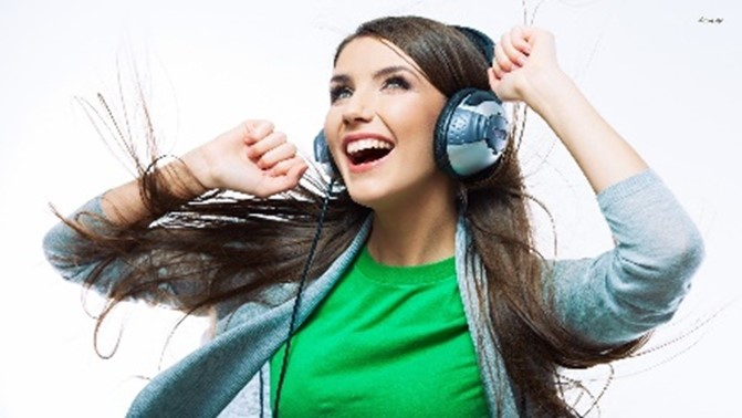 Girl enjoying listening to music enjoy